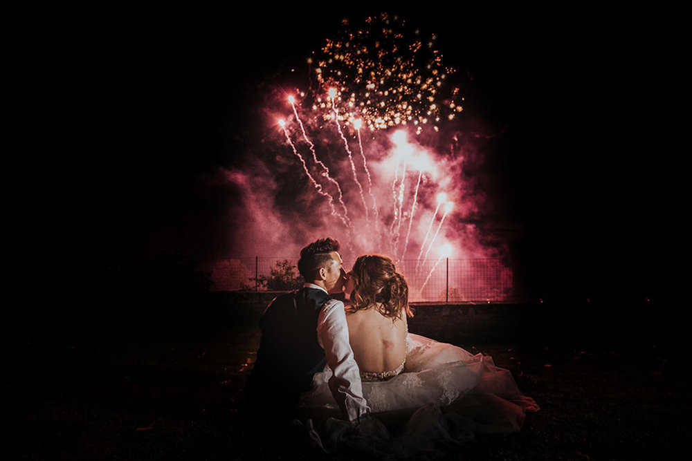 Wedding Couple Kiss With Fireworks - Château du Doux