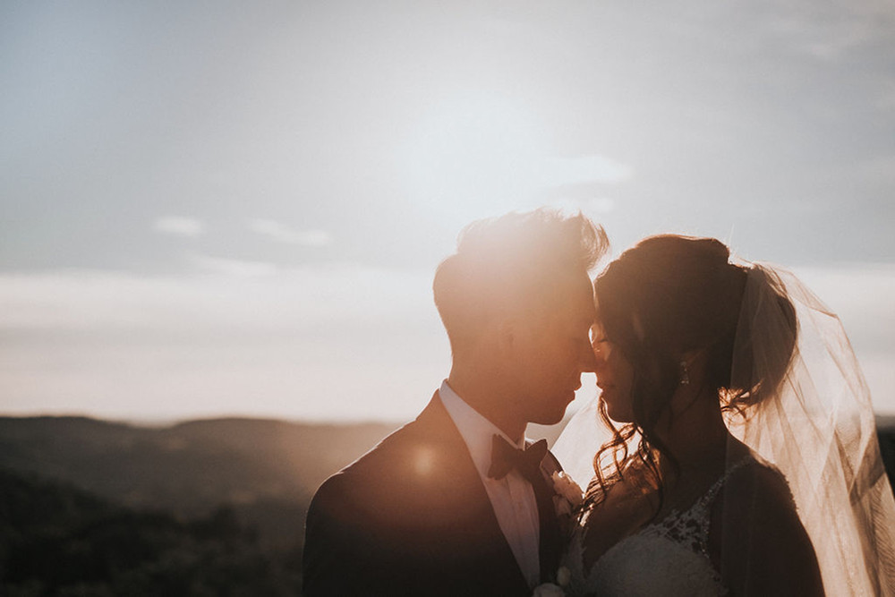 Wedding Couple With Sunny Backdrop - Château du Doux